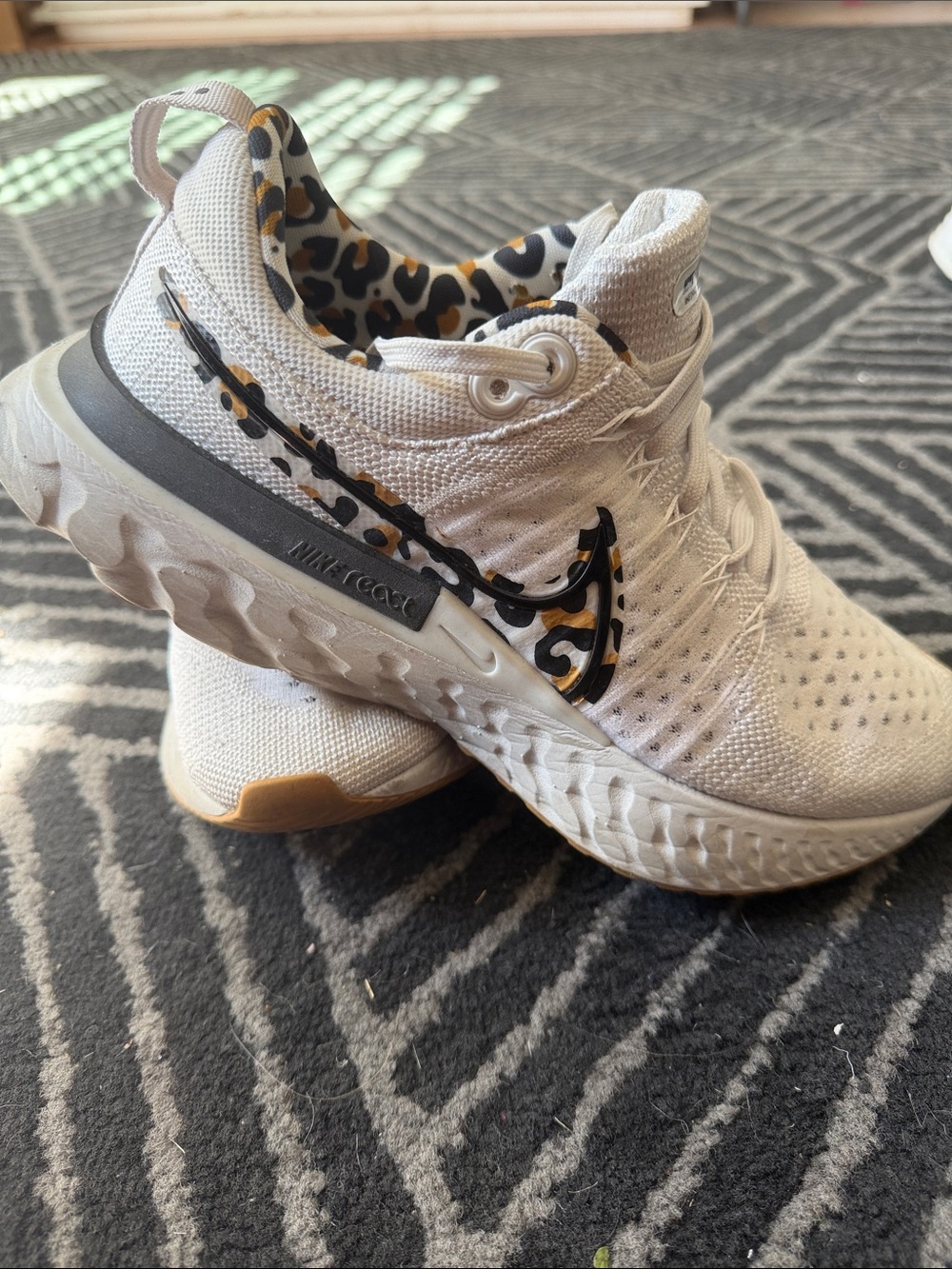 Nike White Running Shoes with Leopard Swoosh